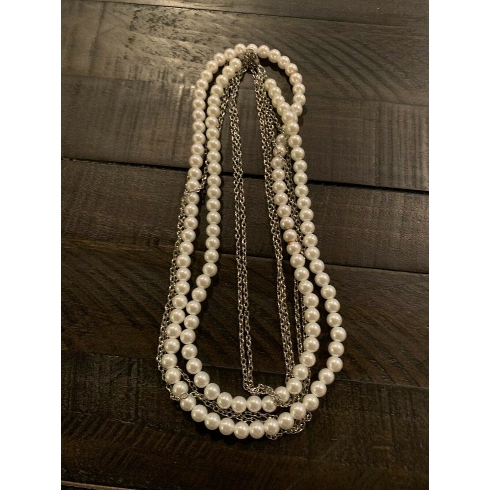 strand of pearls with double silver chain